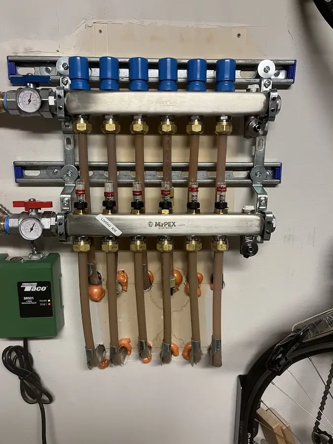 Plumber performing Leak Detection at a residential property in Ludlow